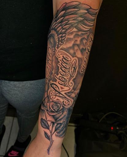 Explore wwe tattoo ideas, creative tattoo ideas in Odessa, available at Black Cat Tattoo Company