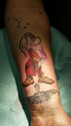 Explore behind ear tattoo ideas, creative tattoo ideas in Myrtle Beach, available at Elite Ink Tattoos of Myrtle Beach