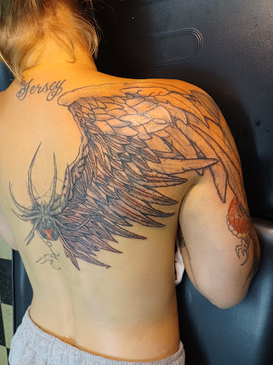 Explore hen tattoo ideas, creative tattoo ideas in Owosso, available at Twisted ink tattoo