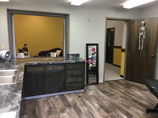 Explore cover up sleeve tattoo ideas, creative tattoo ideas in Grand Forks, available at Blaq Taffy Tattoo