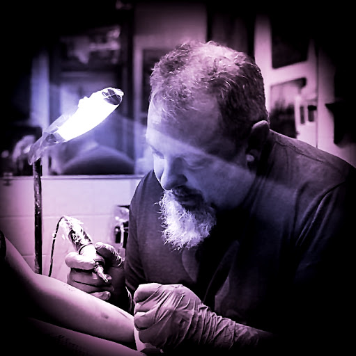 Find charm bracelet tattoo ideas for your next unique tattoo in Myrtle Beach at Elite Ink Tattoos of Myrtle Beach