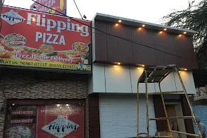 Flipping Pizza image