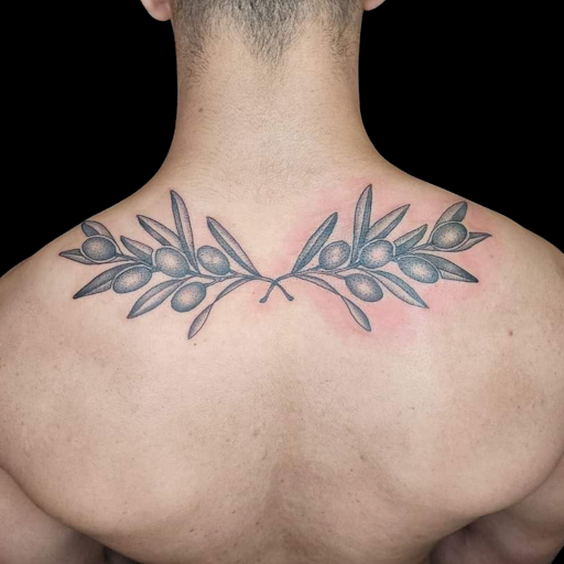 Explore alpha male tattoo ideas, creative tattoo ideas in Dubuque, available at The Crows Nest