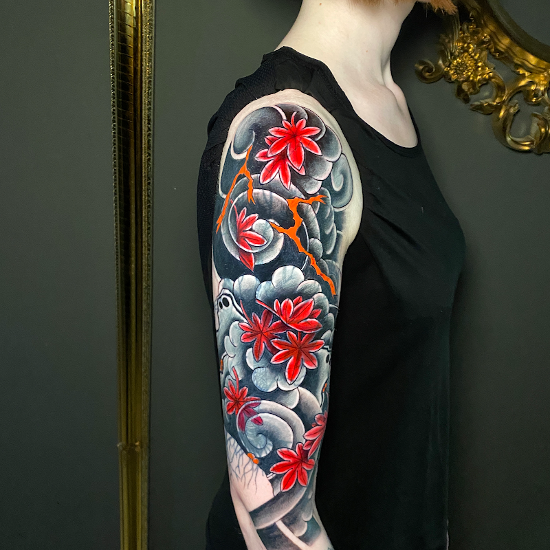Cleopatra INK Tattoo & Piercing München Studio