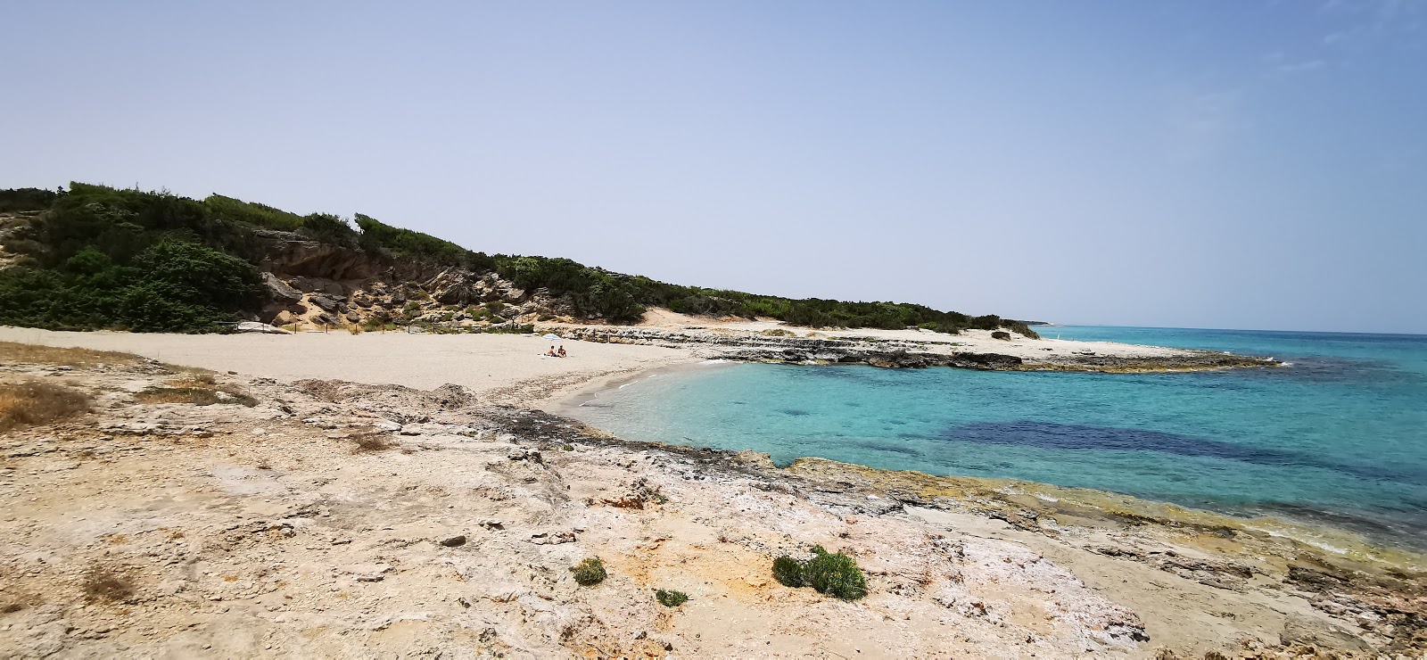 Foto von Quarto di Monte Beach mit beiger sand Oberfläche