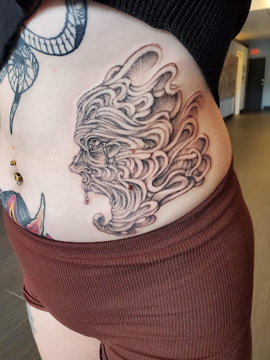 Find playboy bunny tattoo ideas for your next unique tattoo in Palm Harbor at Angry Owl Tattoo and Piercing