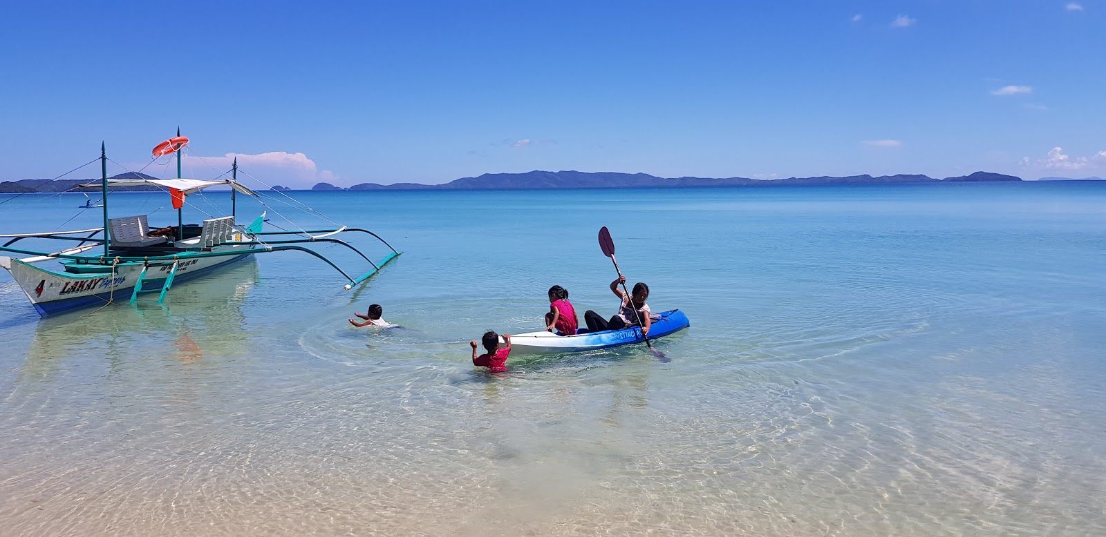 Photo de Naonao Beach avec l'eau cristalline de surface