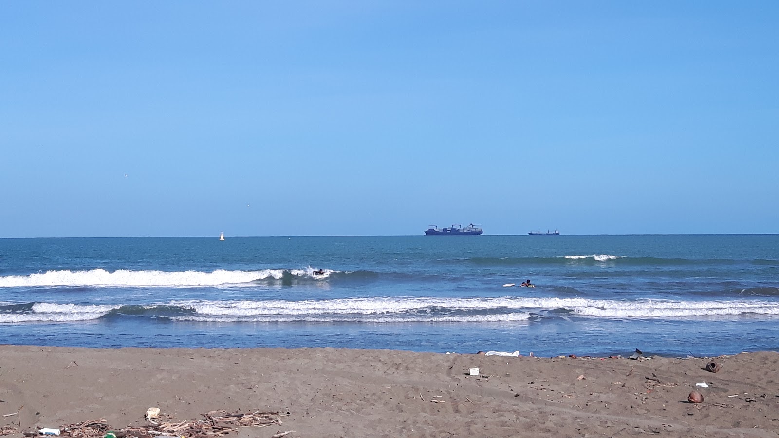 Photo de Playa Cieneguita avec rivage droit, long