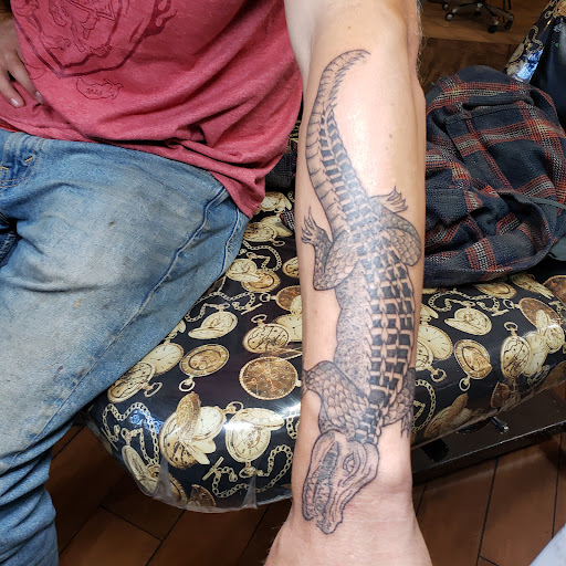 Explore car part tattoo ideas, creative tattoo ideas in Albuquerque, available at Rabbit Hole Tattoo Studio