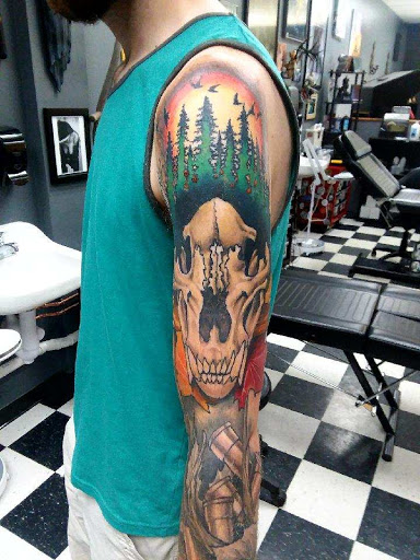 Explore frog tattoo ideas, creative tattoo ideas in Stevens Point, available at Black Rabbit Tattooing