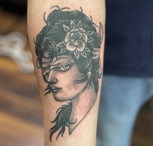 Explore cross tattoo sleeve ideas, creative tattoo ideas in Athens, available at Pain and Wonder Tattoo and Piercing Studio