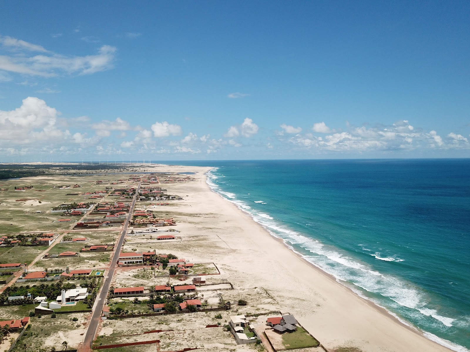 Praia do Taiba'in fotoğrafı geniş plaj ile birlikte