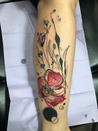 Explore paw tattoo ideas, creative tattoo ideas in Sauk City, available at The Madison Tattoo Company