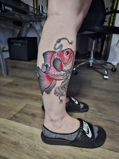 Explore calf tattoo ideas for men, creative tattoo ideas in Bellingham, available at Beluga Palooza Tattoo