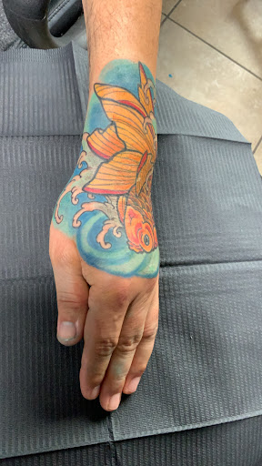 Find heart beat tattoo ideas for your next unique tattoo in El Paso at Santa Rosa Tattoo Studio