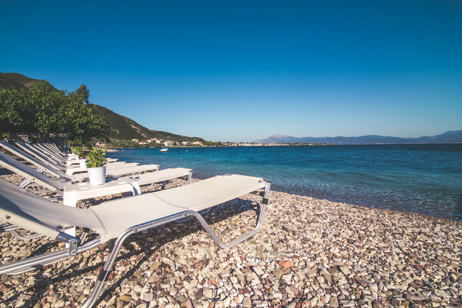 Foto van Agamemnonos beach met turquoise puur water oppervlakte