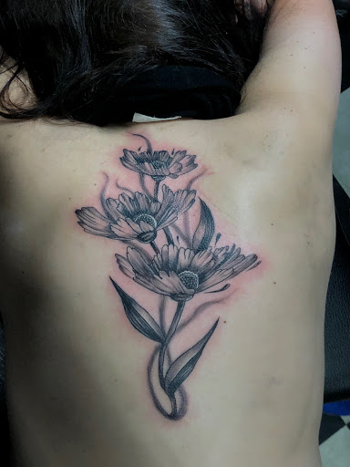 Explore black ink tattoo ideas, creative tattoo ideas in Syracuse, available at Perfect Storm Tattoo