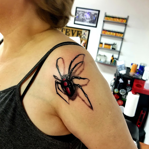 Explore daisy flower tattoo ideas, creative tattoo ideas in Council Bluffs, available at Skin Mechanix Inkorpar8ted