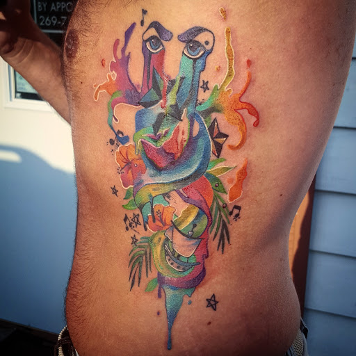 Find feminine skull tattoo ideas for your next unique tattoo in Three Rivers at Portfolio Ink, LLC