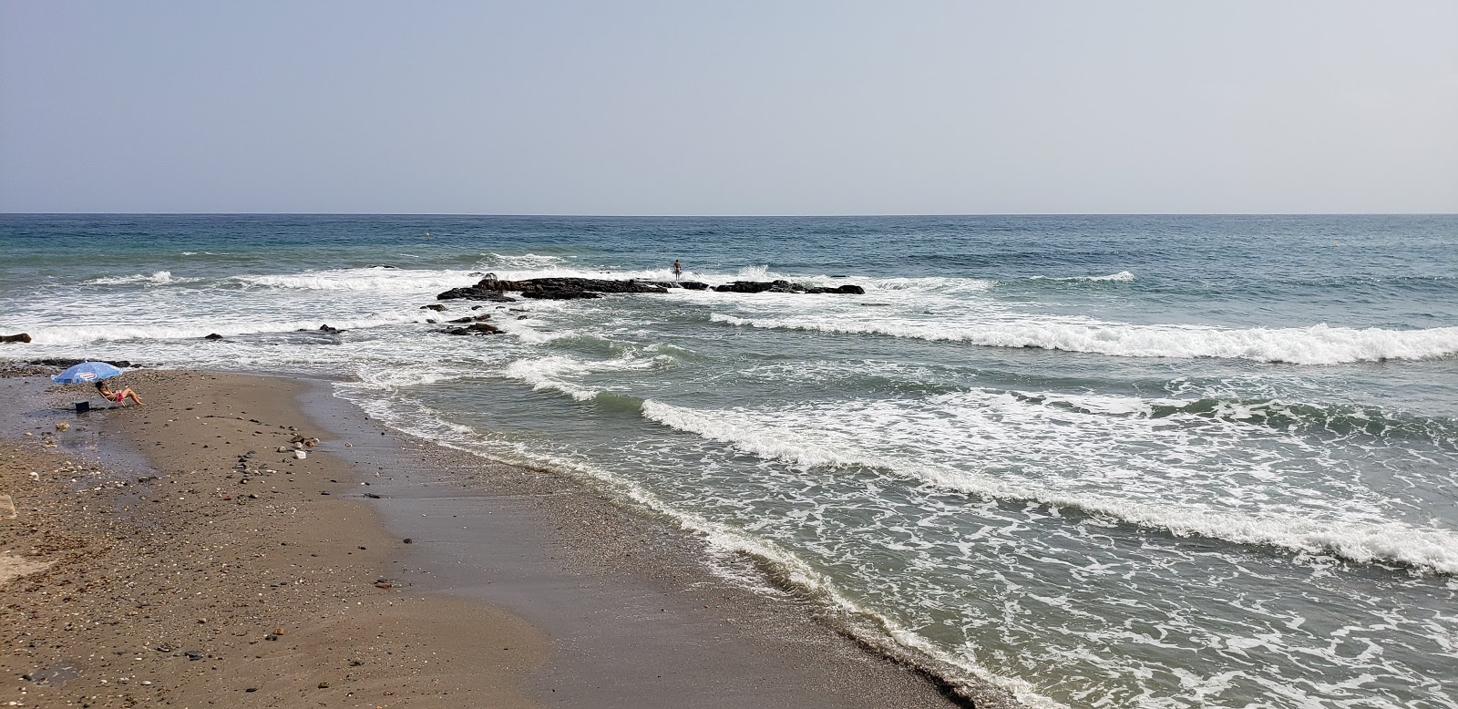 Foto de Playa de Torremuelle com pequena baía