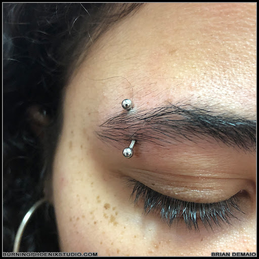 Explore ed hardy tattoo ideas, creative tattoo ideas in Yonkers, available at Burning Phoenix Studio