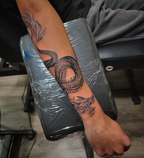 Find boob tattoo ideas for your next unique tattoo in Tampa at Private Ink Studio