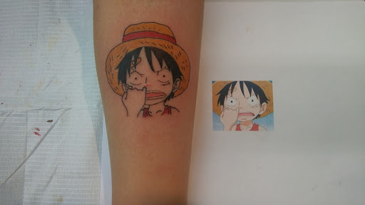 Explore bite mark tattoo ideas, creative tattoo ideas in Houston, available at LOBOS TATTOO PARLOR