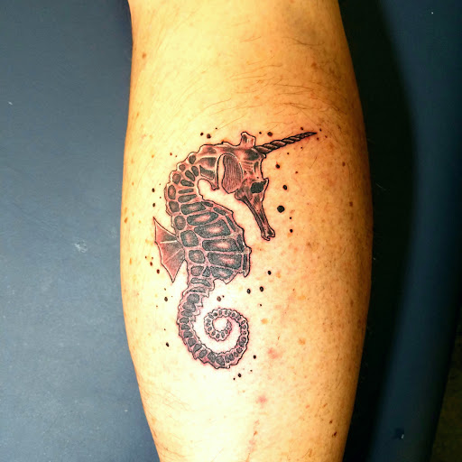 Explore female hip tattoo ideas, creative tattoo ideas in Mebane, available at The Cardinal Skin Art & Gallery