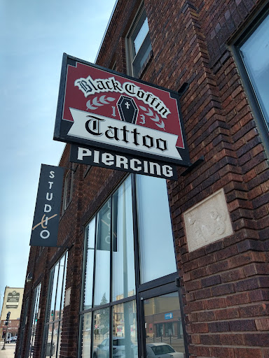 Explore trinidad tattoo ideas, creative tattoo ideas in Saint Paul, available at Black Coffin Tattoo