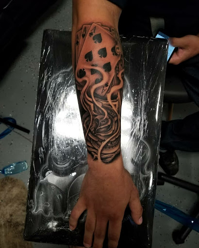 Find clouds tattoo ideas for your next unique tattoo in Bakersfield at KUSTOM CREATIONS TATTOO & PIERCING STUDIO