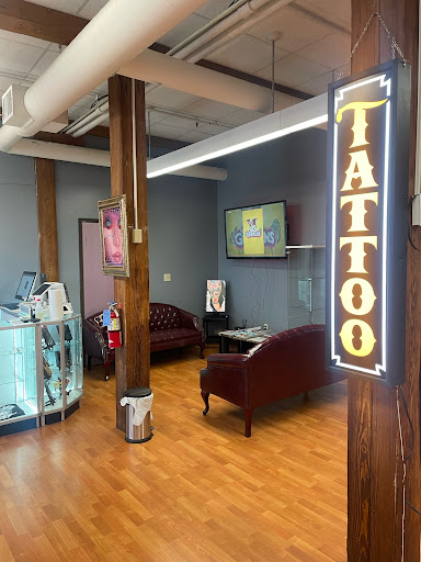 Explore wedding band tattoo ideas for him, creative tattoo ideas in Keene, available at Creative Ink Tattoo Studio