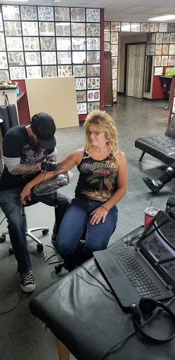 Explore small book tattoo ideas, creative tattoo ideas in Schenectady, available at Legacy Tattoo