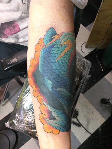 Tattoo Shop «Ink Slingers», reviews and photos, 1355 E Kearney St, Springfield, MO 65803, USA