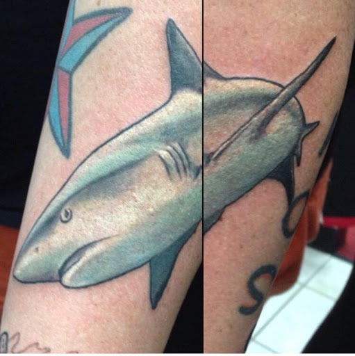 Find arm band tattoo ideas for your next unique tattoo in Tarpon Springs at Legendary Custom Tattoos and Piercings