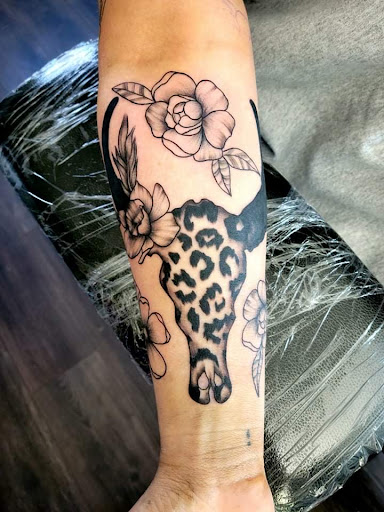 Explore spider-man tattoo ideas, creative tattoo ideas in Warrensburg, available at Altered Visions Tattoo Studio