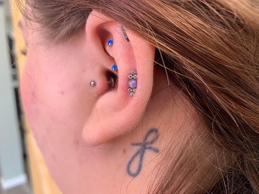 Explore buddhist tattoo ideas, creative tattoo ideas in Omaha, available at Sushi Balloon Body Piercing