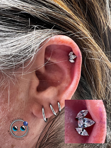 Explore car mechanic tattoo ideas, creative tattoo ideas in Loganville, available at Not Of This World Tattoo & Piercing
