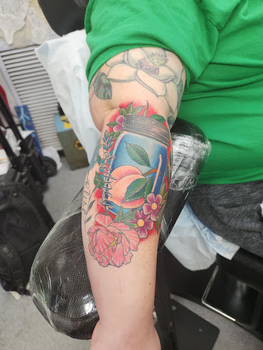 Explore arm tribal tattoo cover up ideas, creative tattoo ideas in Leesburg, available at Trademark Body Art