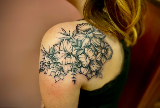 Explore mechanical sleeve tattoo ideas, creative tattoo ideas in Batavia, available at The Pretty Pin-Up Tattoo Parlor