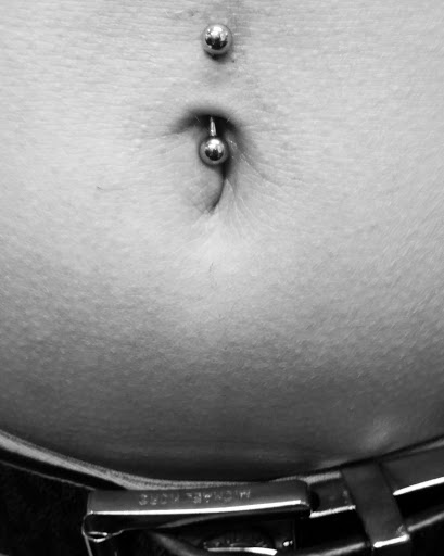 Explore birth flower tattoo ideas, creative tattoo ideas in Albuquerque, available at Staceys Exotic Body Piercing and Tattoo