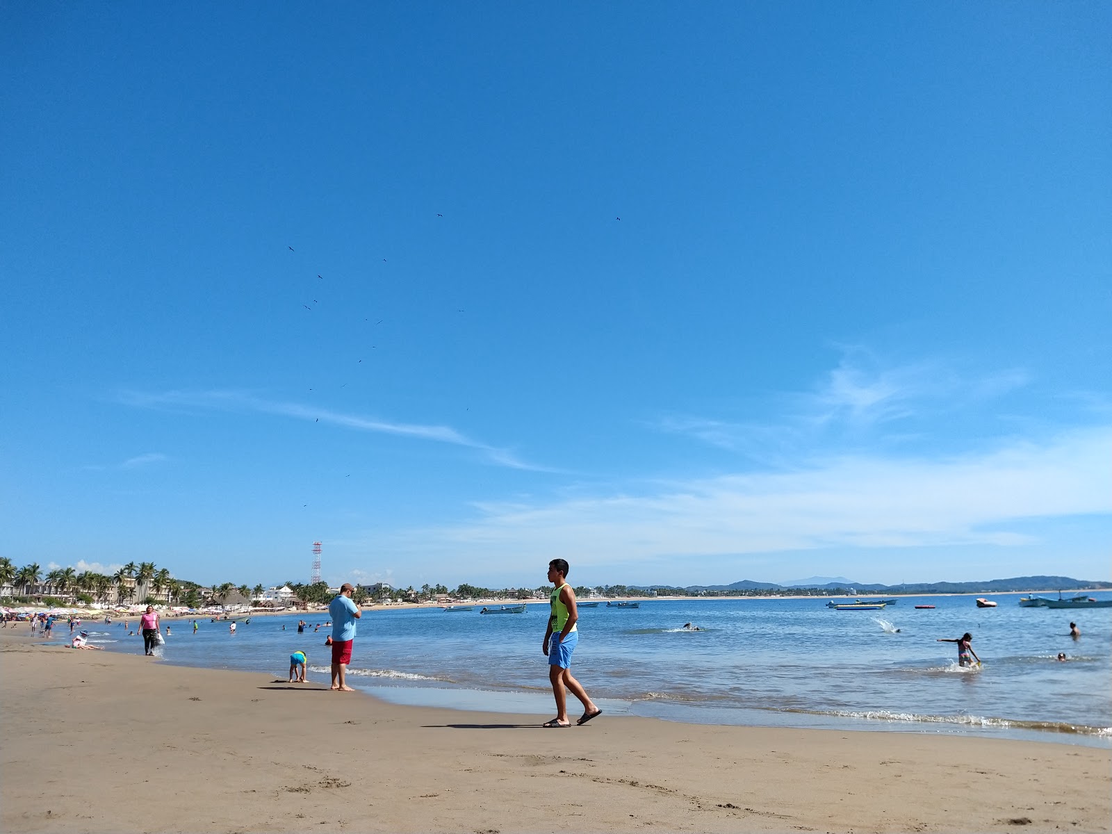 Fotografie cu Playa De Melaque și așezarea