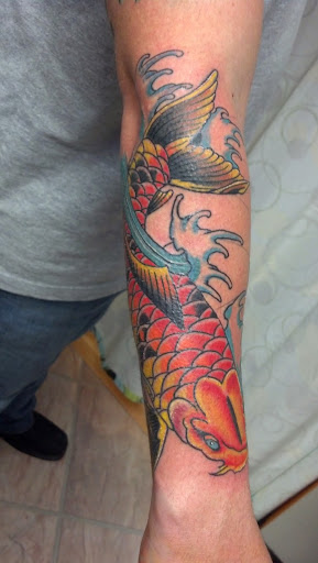 Explore paisley tattoo ideas, creative tattoo ideas in Madison, available at Steves Tattoo & Body Piercing