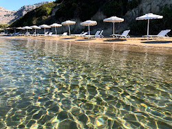 Photo de Plage de Kavos partiellement zone de villégiature