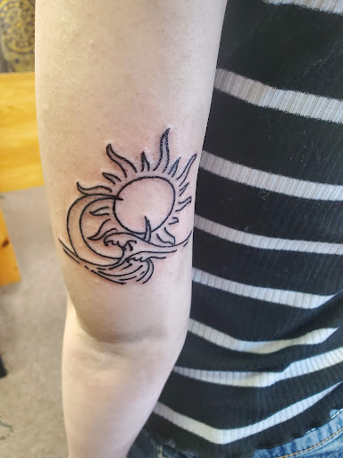 Explore lion cub tattoo ideas, creative tattoo ideas in Stroudsburg, available at RockN Willys Tattoo & Piercing