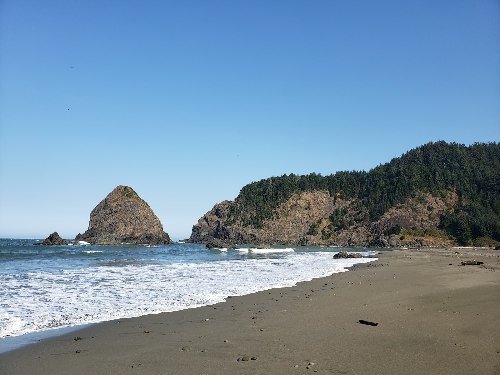 Photo of Whaleshead Beach with gray sand surface