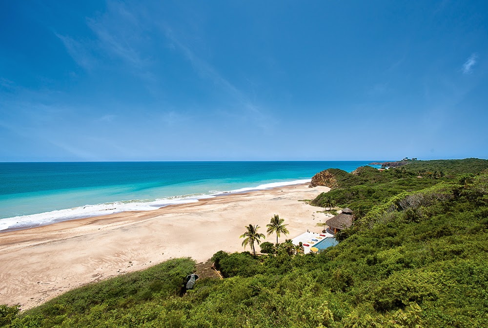 Foto de Cuixmala beach com areia bege superfície