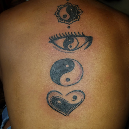 Explore red ink neck tattoo ideas, creative tattoo ideas in Raleigh, available at Gifted Styles