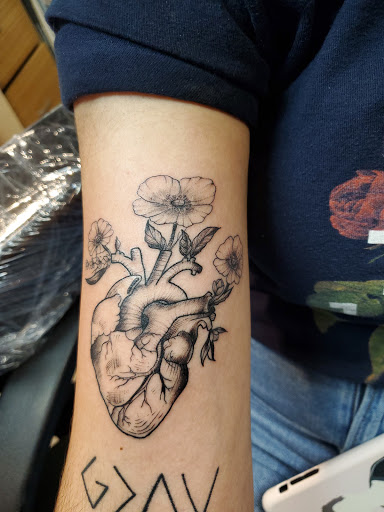 Explore triple moon tattoo ideas, creative tattoo ideas in Fort Pierce, available at Goodfellas Tattoo & Body Piercing