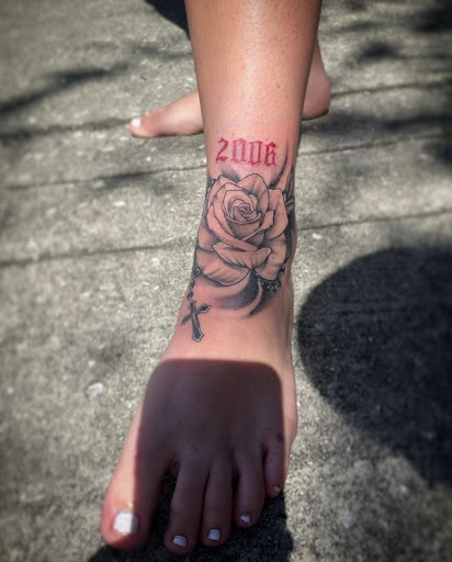 Find between the breast tattoo ideas for your next unique tattoo in North Fort Myers at Loyal 2 The Coil Tattoos & Body Piercings