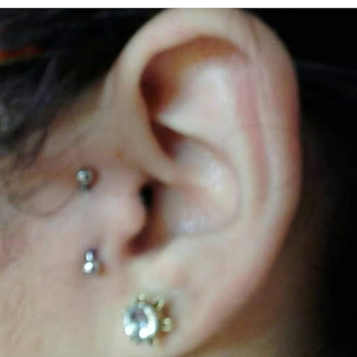 Explore cancer ribbon tattoo ideas, creative tattoo ideas in Hialeah, available at Allstar Tattoo & Body piercing